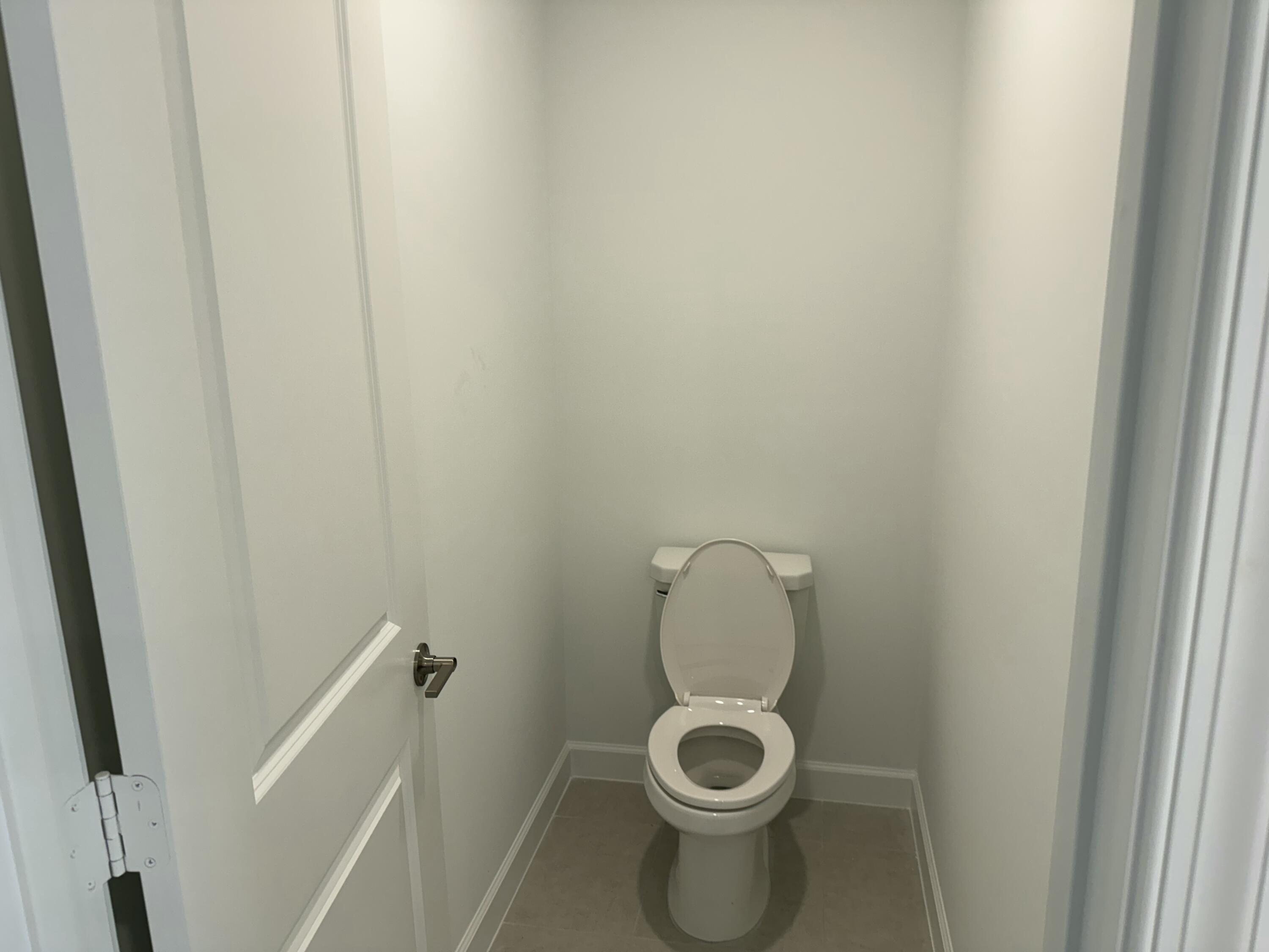 10445 Northwest Suncrest Loop Port Port St. Lucie, FL 34987 - Photo 27 of 45 a close view of a bathroom with a sink