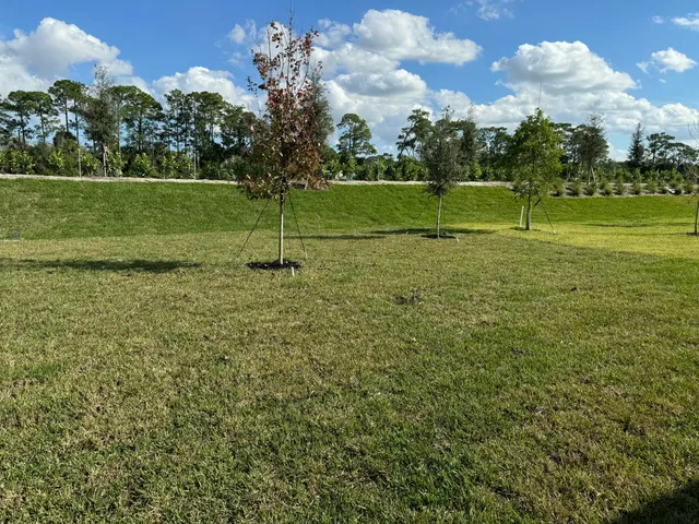 a view of a golf course with a lake