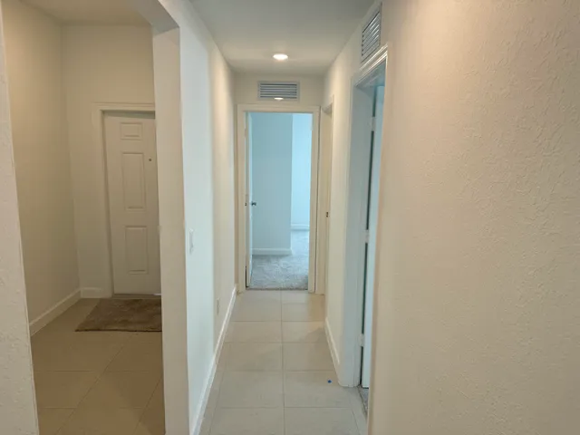 a view of hallway with shower