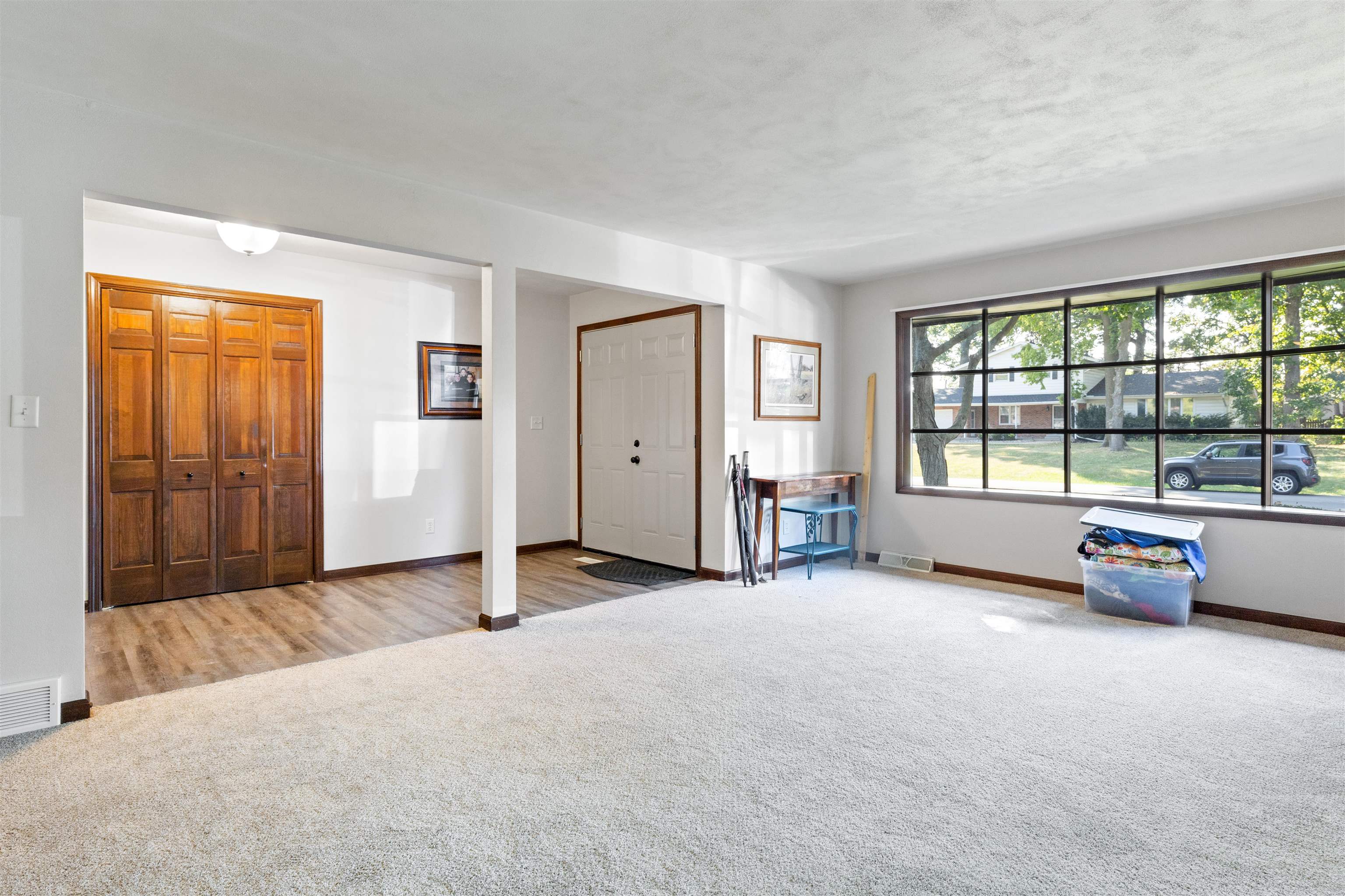 2518 Mandrake Drive Rockford, IL 61108 - Photo 11 of 50 an empty room with windows and view of balcony