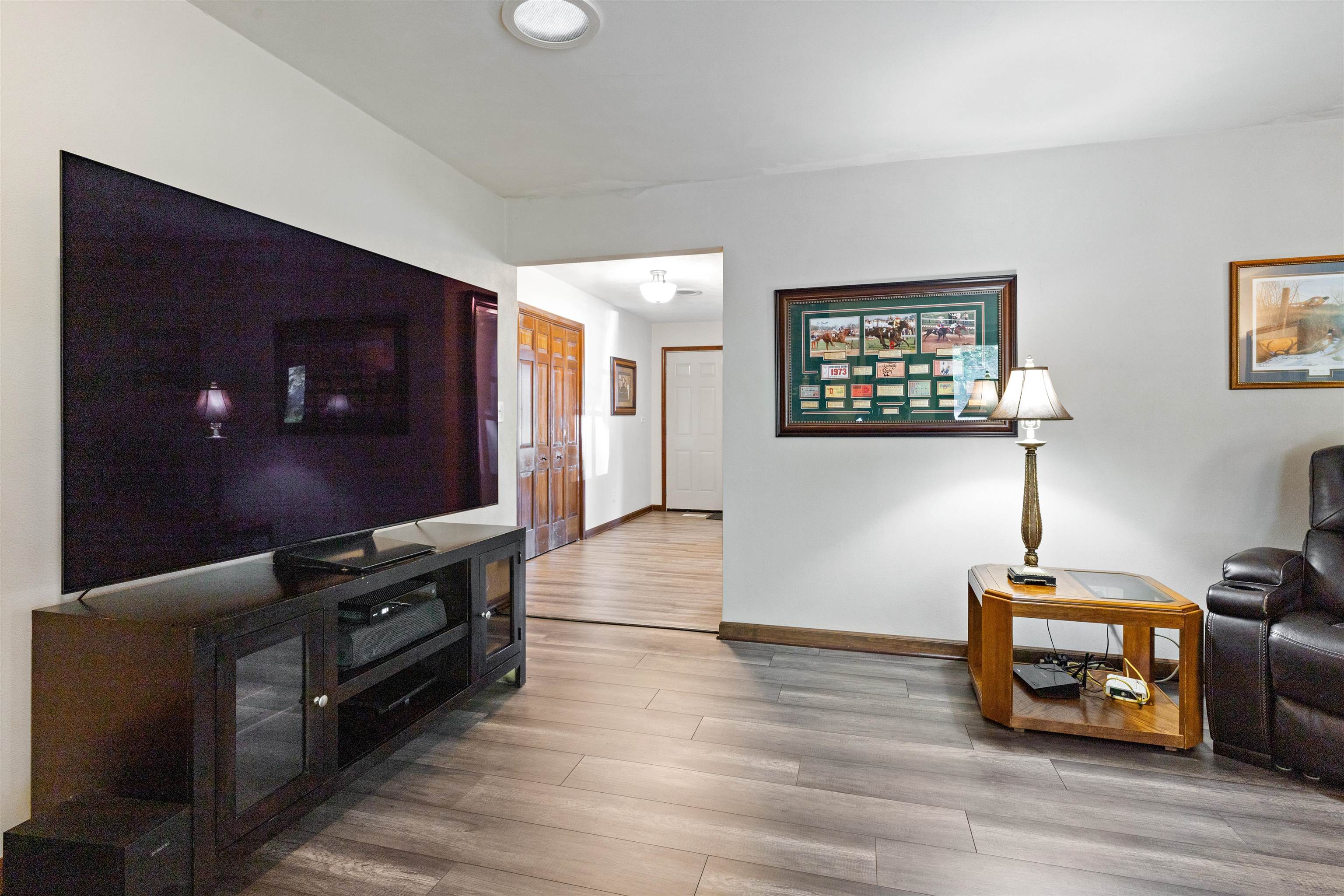 2518 Mandrake Drive Rockford, IL 61108 - Photo 18 of 50 a room with furniture and a flat screen tv