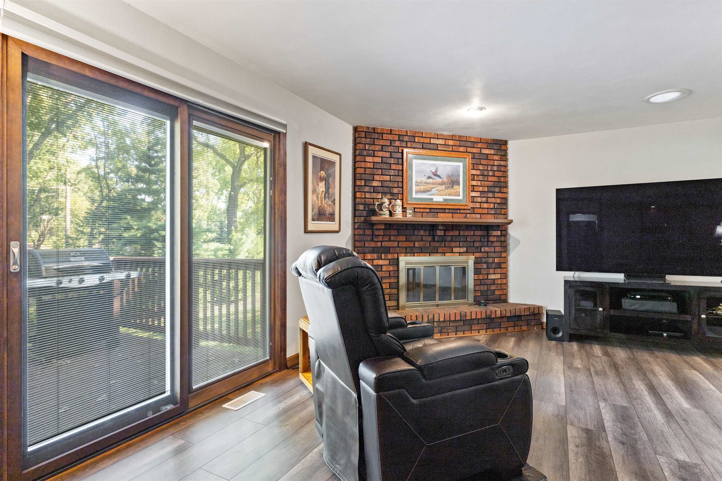 2518 Mandrake Drive Rockford, IL 61108 - Photo 19 of 50 a living room with furniture and a flat screen tv