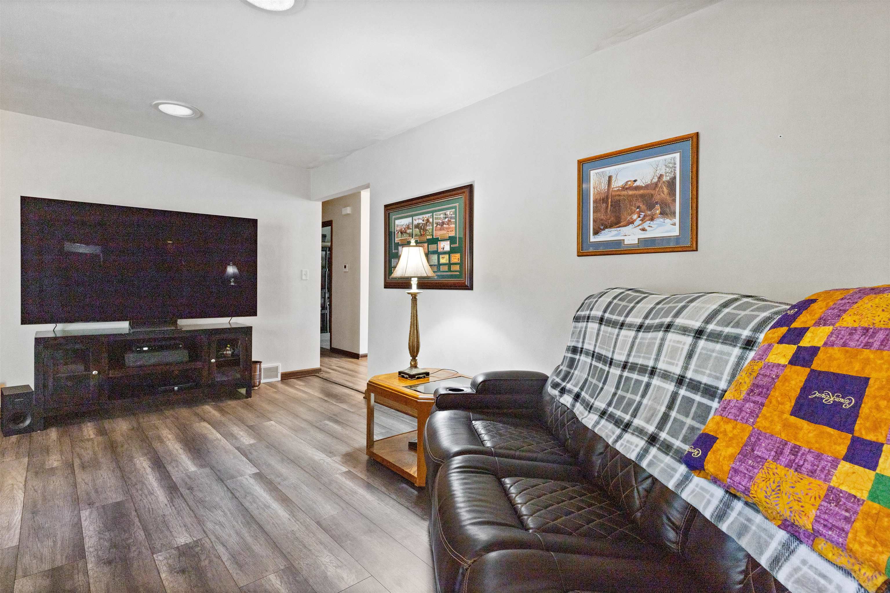 2518 Mandrake Drive Rockford, IL 61108 - Photo 21 of 50 a living room with furniture and a flat screen tv