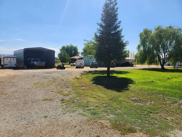 a view of a garden with an outdoor space