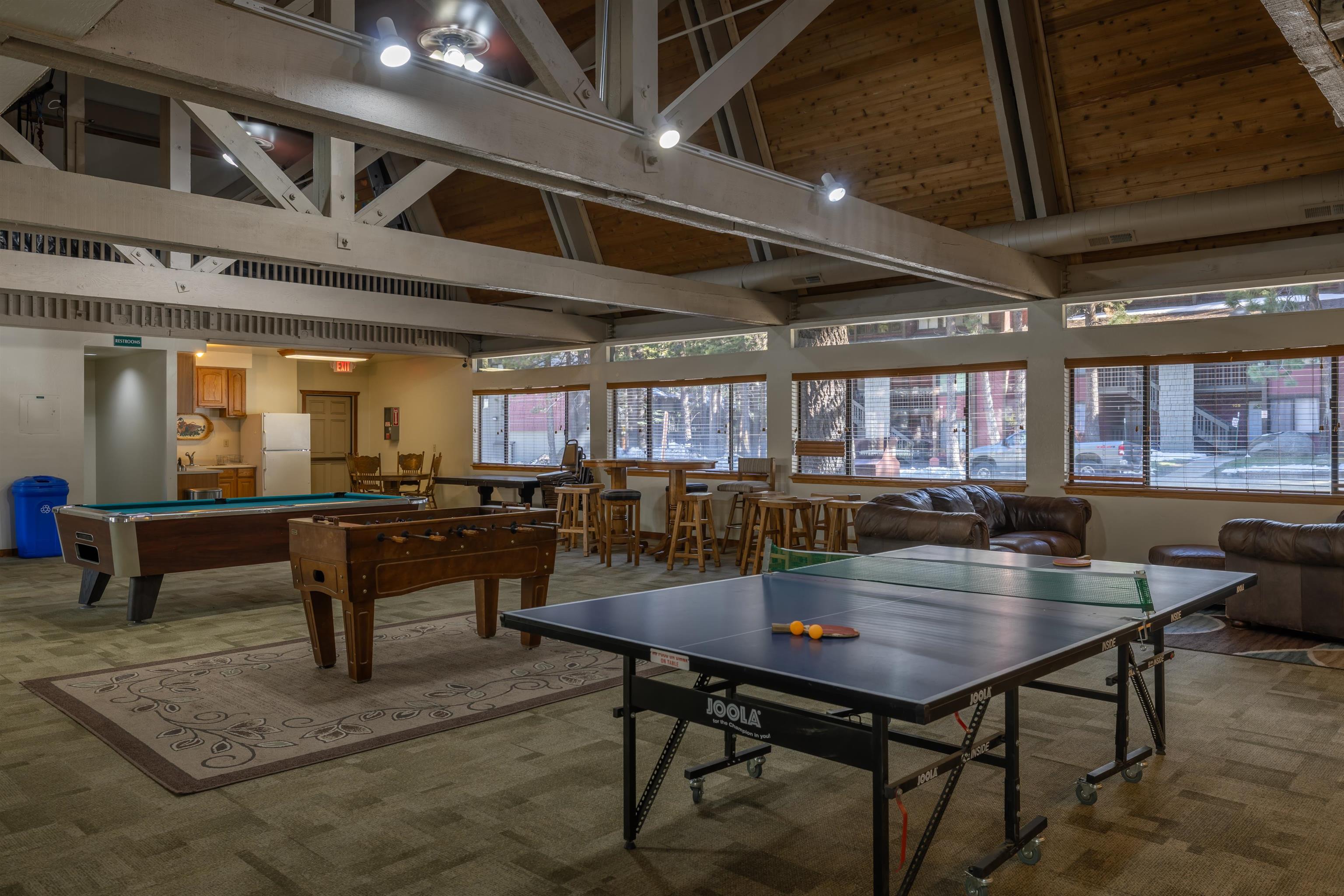 2252 Meridian Boulevard, Unit 32 Mammoth Lakes, CA 93546 - Photo 29 of 31 Game room featuring vaulted ceiling and billiards