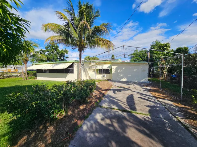 a view of a backyard with a garden