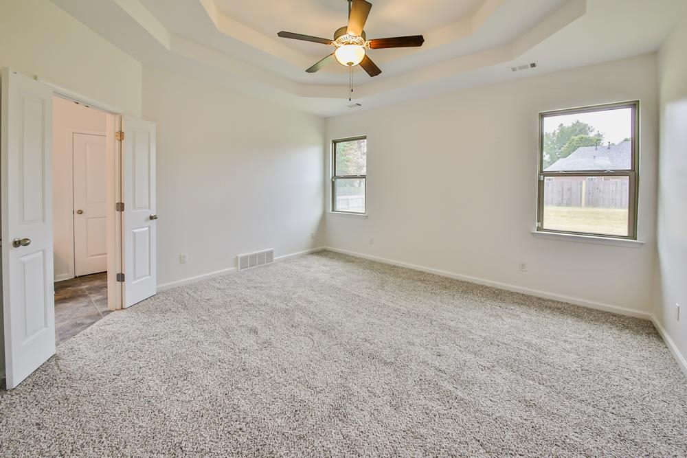 6839 Hare Pointe Bartlett, TN 38002 - Photo 15 of 35 an empty room with windows and fan