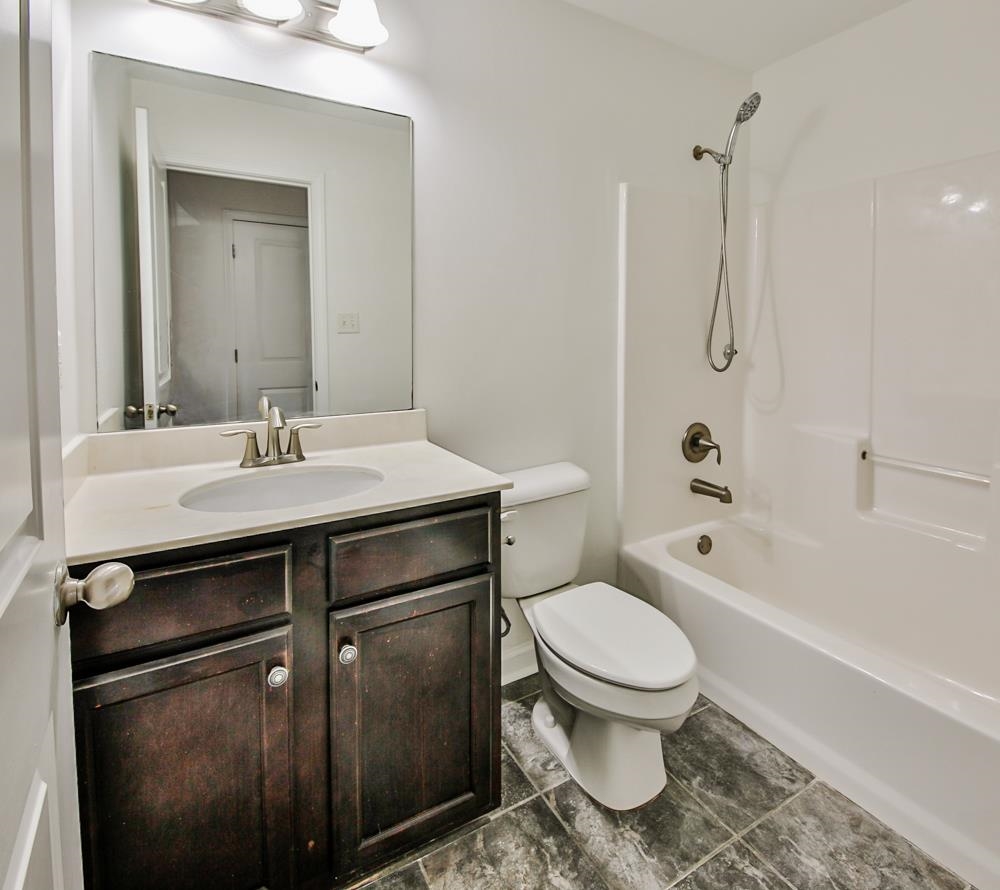 6839 Hare Pointe Bartlett, TN 38002 - Photo 28 of 35 a bathroom with a sink toilet and shower