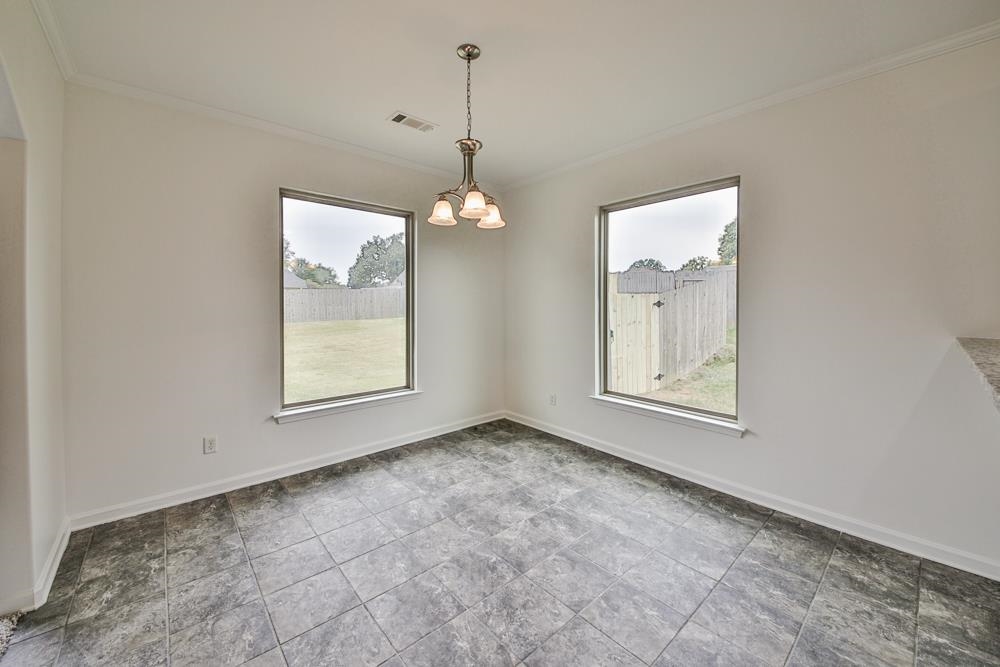 6839 Hare Pointe Bartlett, TN 38002 - Photo 9 of 35 an empty room with windows