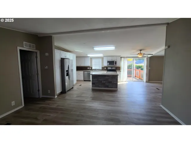 a bathroom with a sink a mirror and a toilet