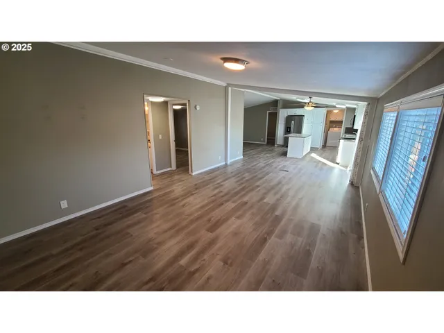 a black and white photo of a living room