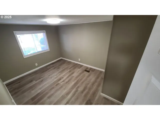 a view of a balcony with door