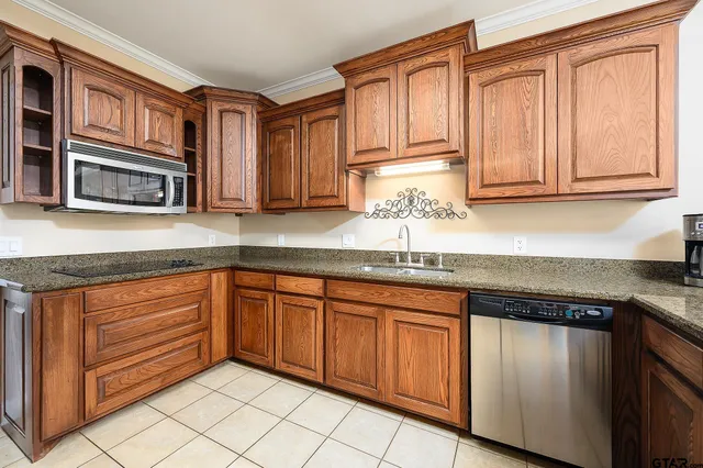 a view of a dining room and livingroom with furniture window and outside view