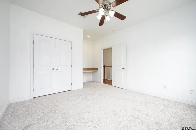 a bathroom with a double vanity sink and mirror