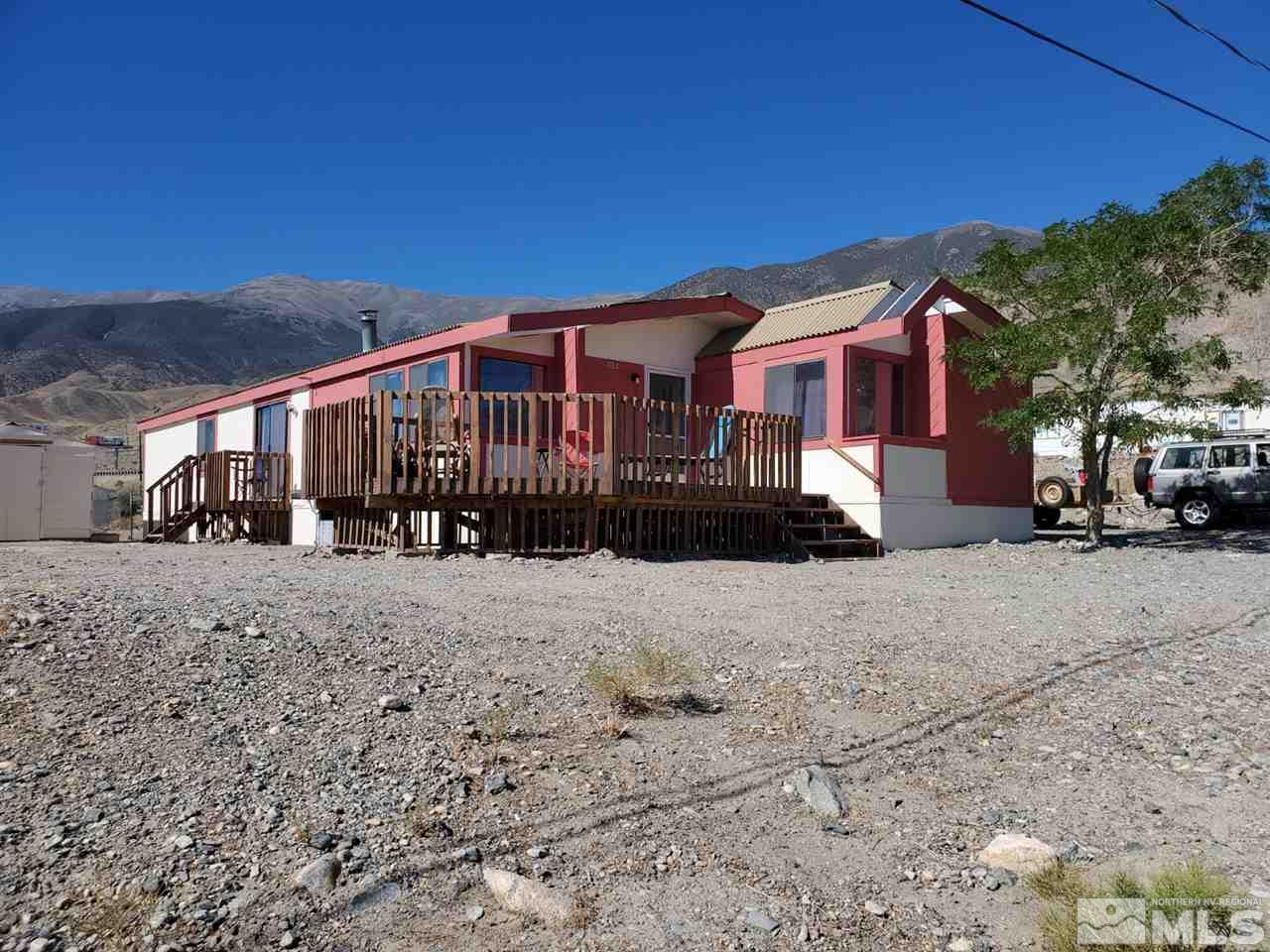 132 Lucille Drive Walker Lake, NV 89415 - Photo 1 of 36 a front view of a house with a yard