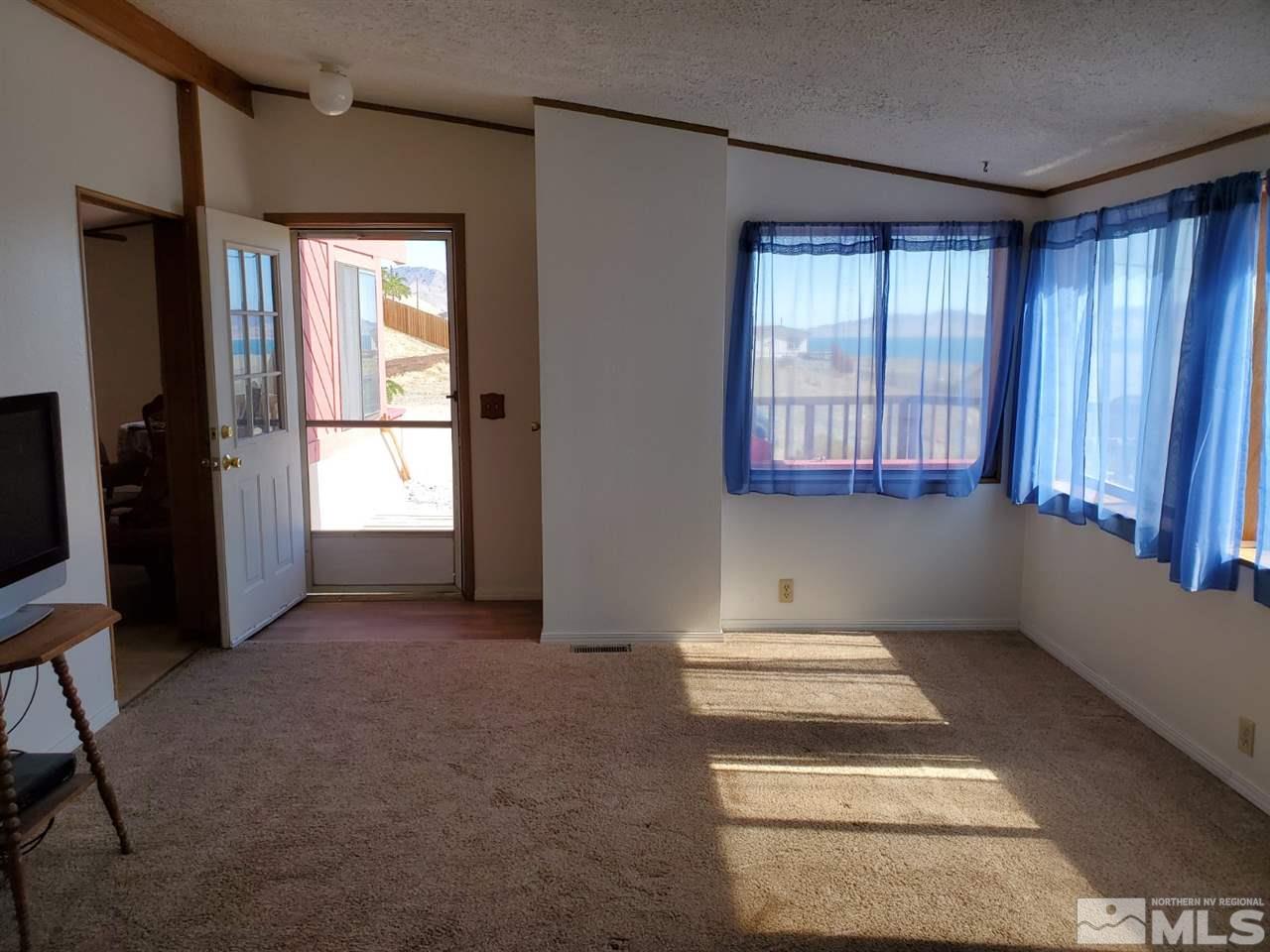 132 Lucille Drive Walker Lake, NV 89415 - Photo 12 of 36 an empty room with windows