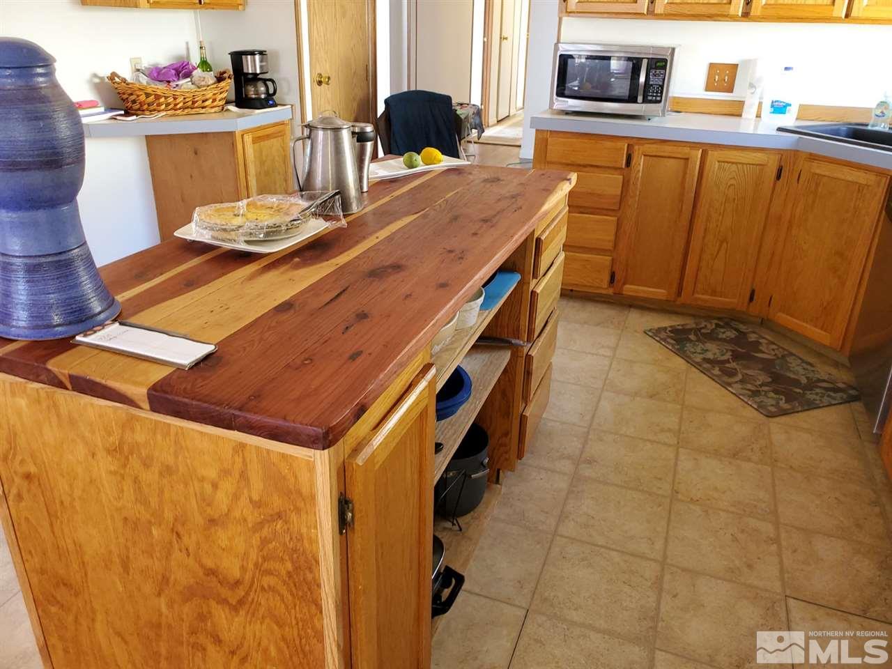 132 Lucille Drive Walker Lake, NV 89415 - Photo 22 of 36 a terrace with a table and chairs