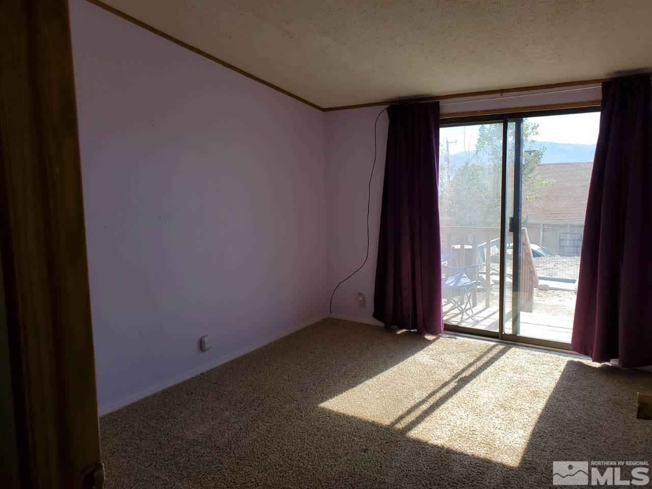 132 Lucille Drive Walker Lake, NV 89415 - Photo 28 of 36 an empty room with windows
