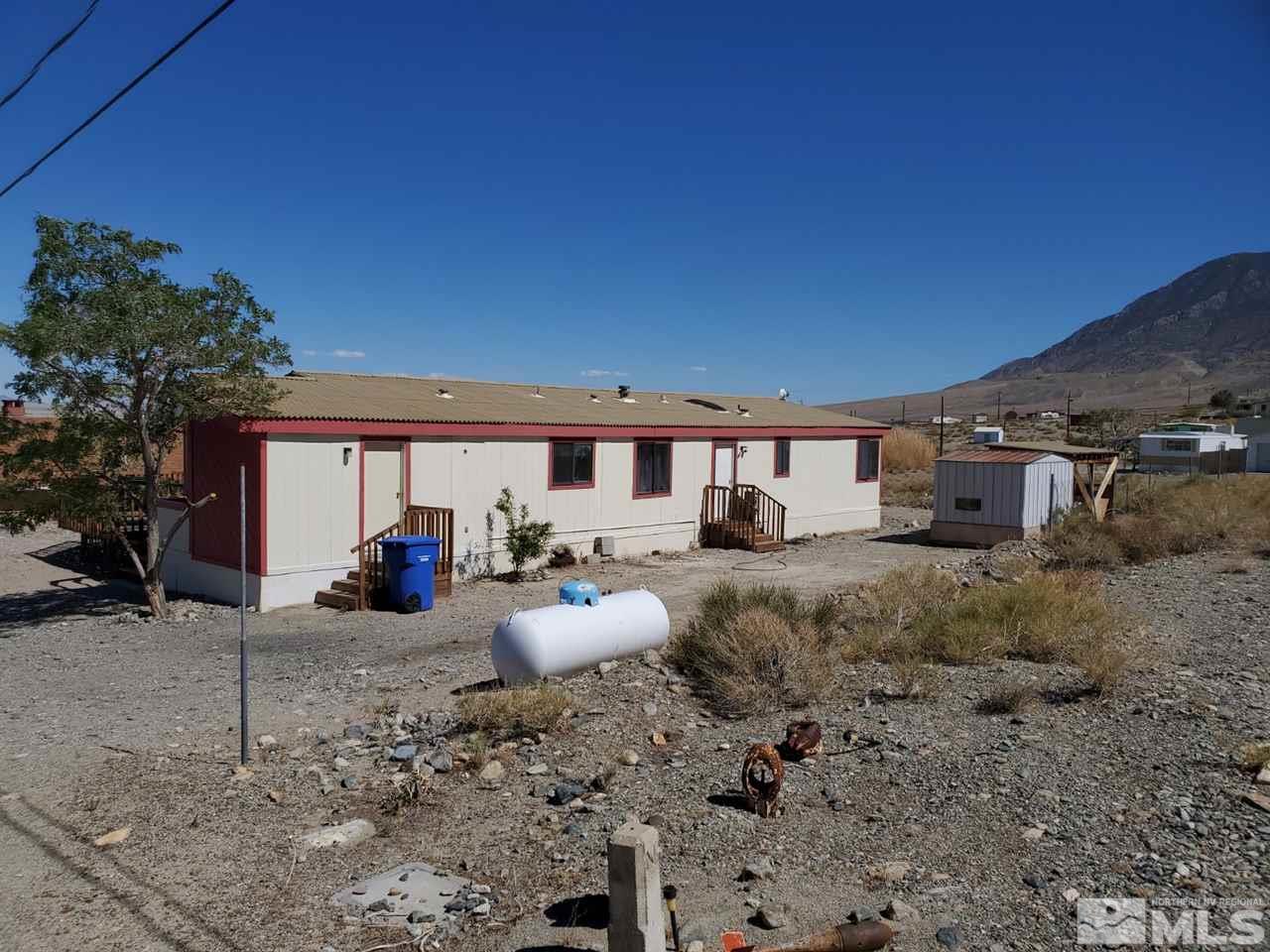 132 Lucille Drive Walker Lake, NV 89415 - Photo 4 of 36 a view of a house with backyard