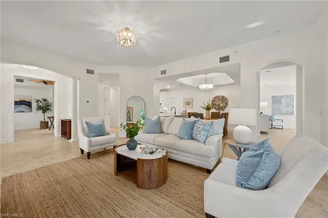 a living room with a couch and a table