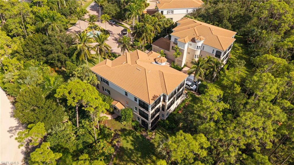 2886 Castillo Court, Unit 101 Naples, FL 34109 - Photo 34 of 45 a view of a multi story building