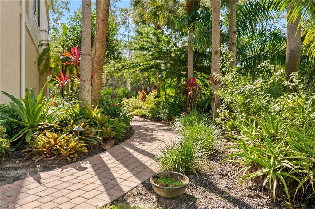 2886 Castillo Court, Unit 101 Naples, FL 34109 - Photo 35 of 45 a view of a garden with plants