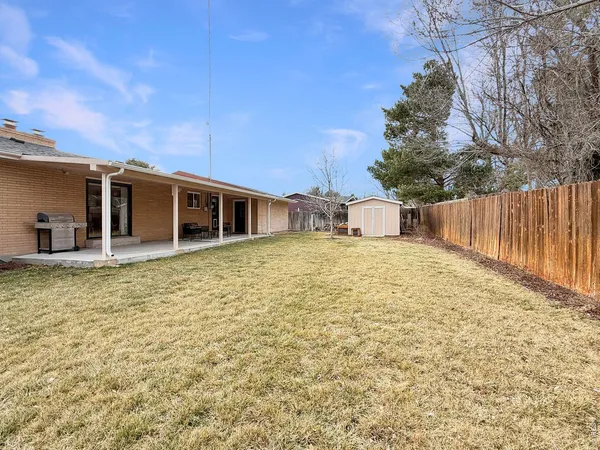 a house view with a backyard space