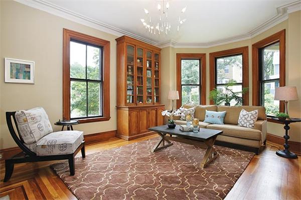 273 Walnut Street Brookline, MA 02445 - Photo 2 of 10 a living room with furniture and large windows