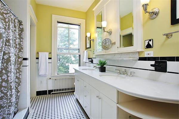 273 Walnut Street Brookline, MA 02445 - Photo 9 of 10 a bathroom with a sink a mirror and a shower