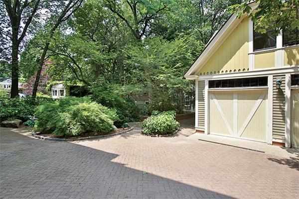 273 Walnut Street Brookline, MA 02445 - Photo 10 of 10 front view of a house with a yard