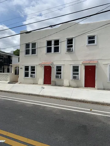a view of a building with a barbeque