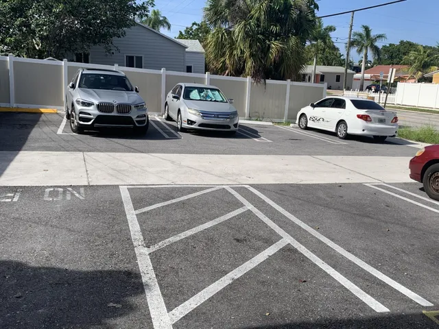 a view of street with parked cars
