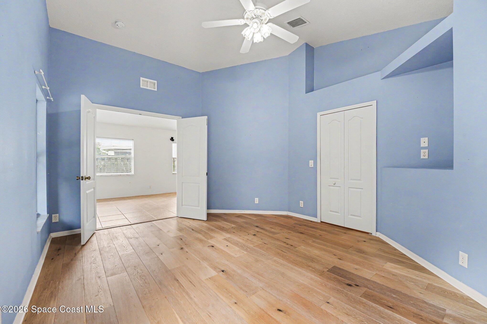 2194 Spring Creek Circle Palm Bay, FL 32905 - Photo 13 of 40 Primary Bedroom Suite.Double Door Entry