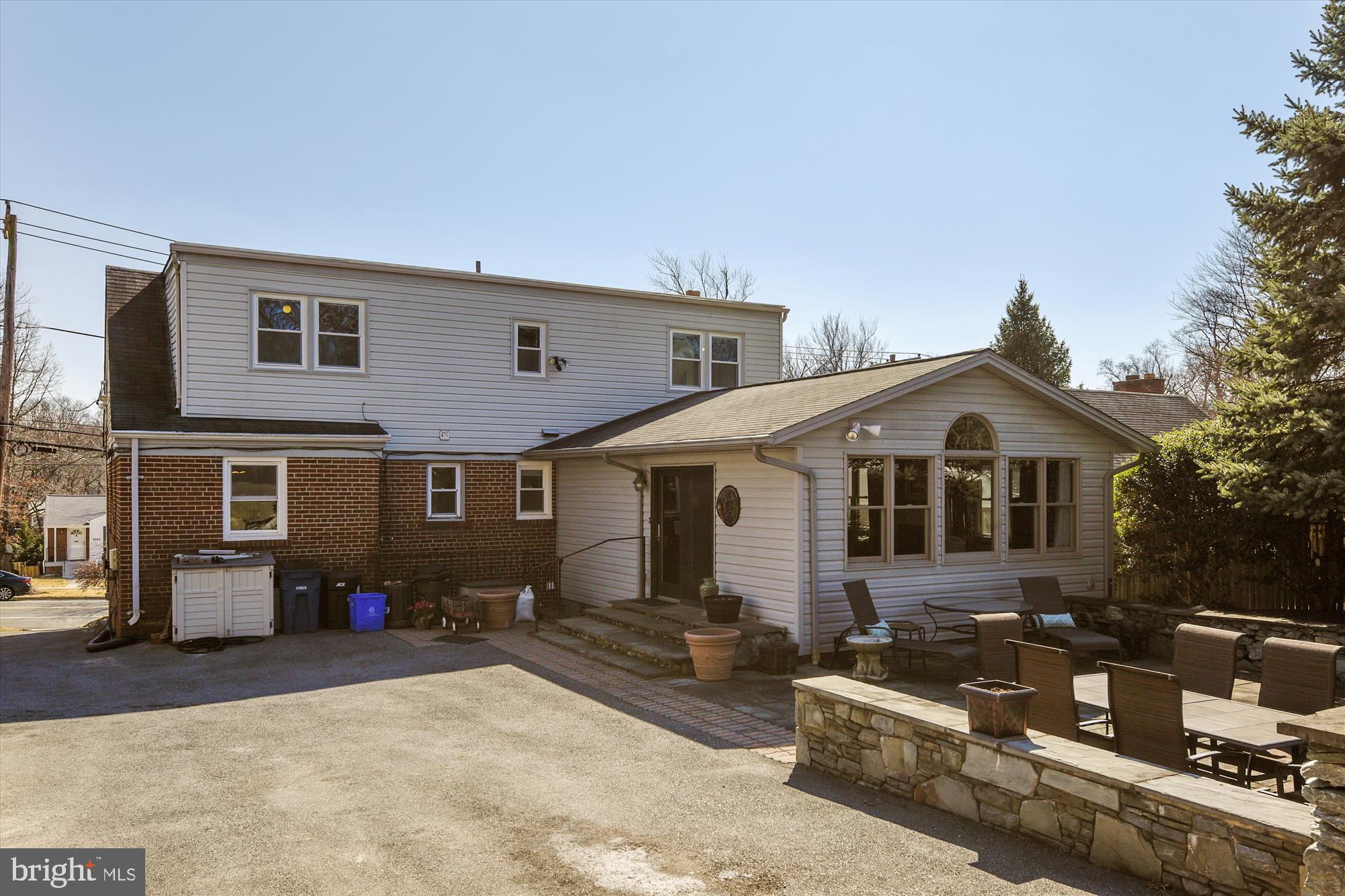 2909 Plyers Mill Road Silver Spring, MD 20902 - Photo 24 of 30 Rear large driveway and stone patio