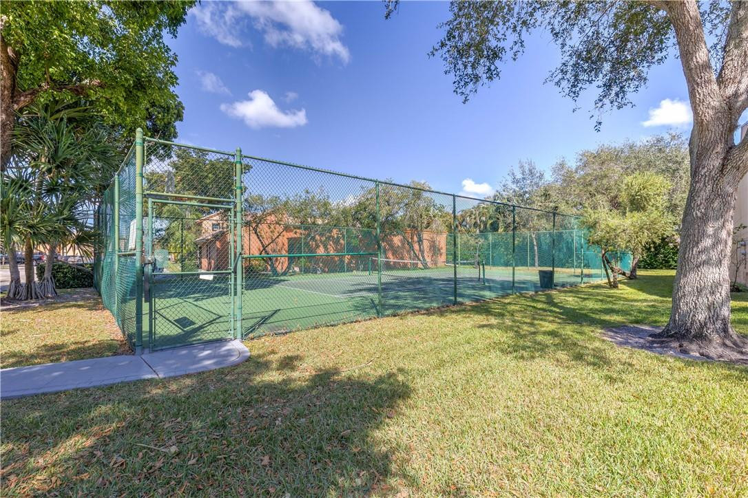 9717 North New River Canal Road, Unit 409 Plantation, FL 33324 - Photo 18 of 20 a view of a park with a tree