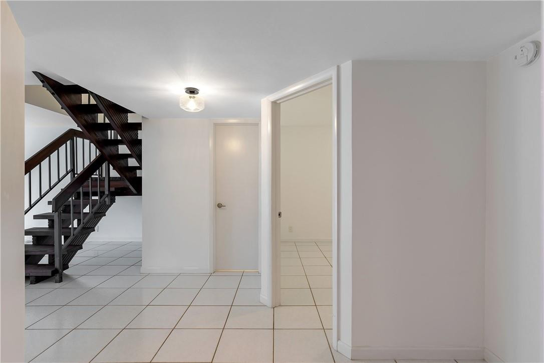 9717 North New River Canal Road, Unit 409 Plantation, FL 33324 - Photo 6 of 20 a view of an entryway with stairs
