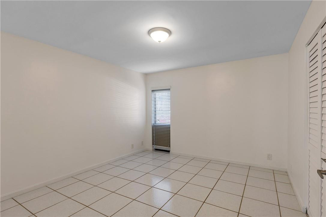 9717 North New River Canal Road, Unit 409 Plantation, FL 33324 - Photo 10 of 20 a view of an empty room and window