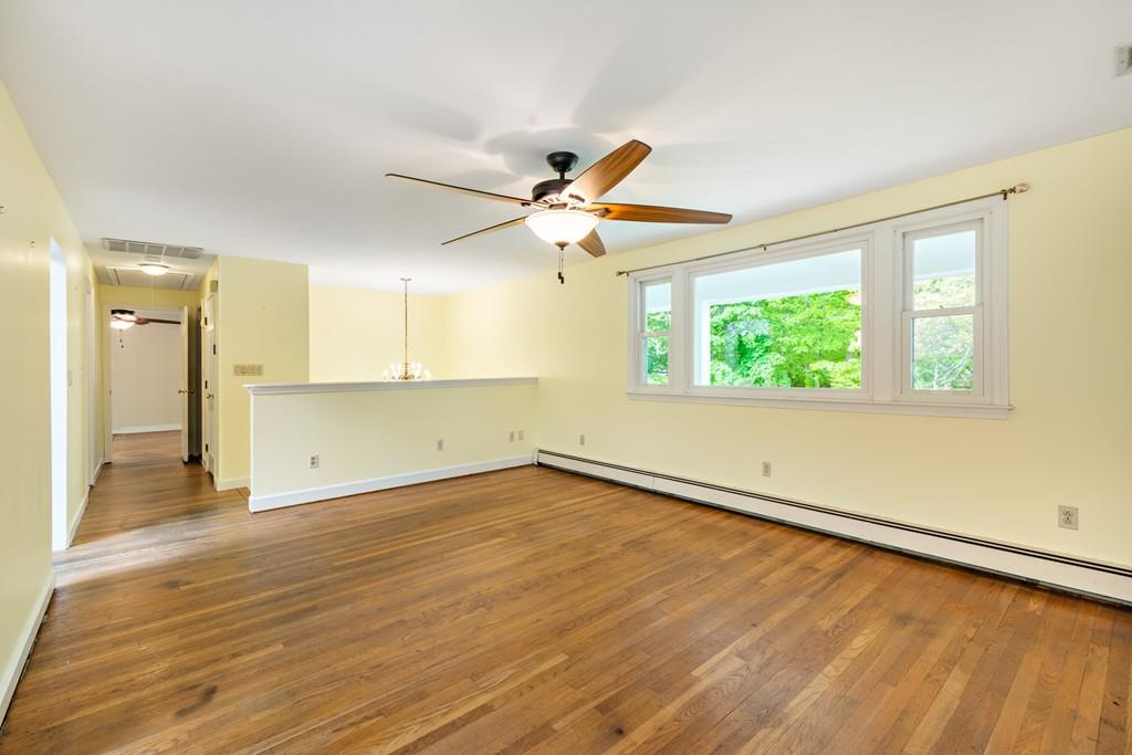 40 James Road Hanover, MA 02339 - Photo 27 of 41 wooden floor in an empty room with a window