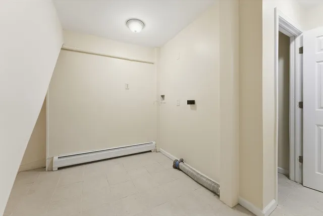 a view of a room with an empty space