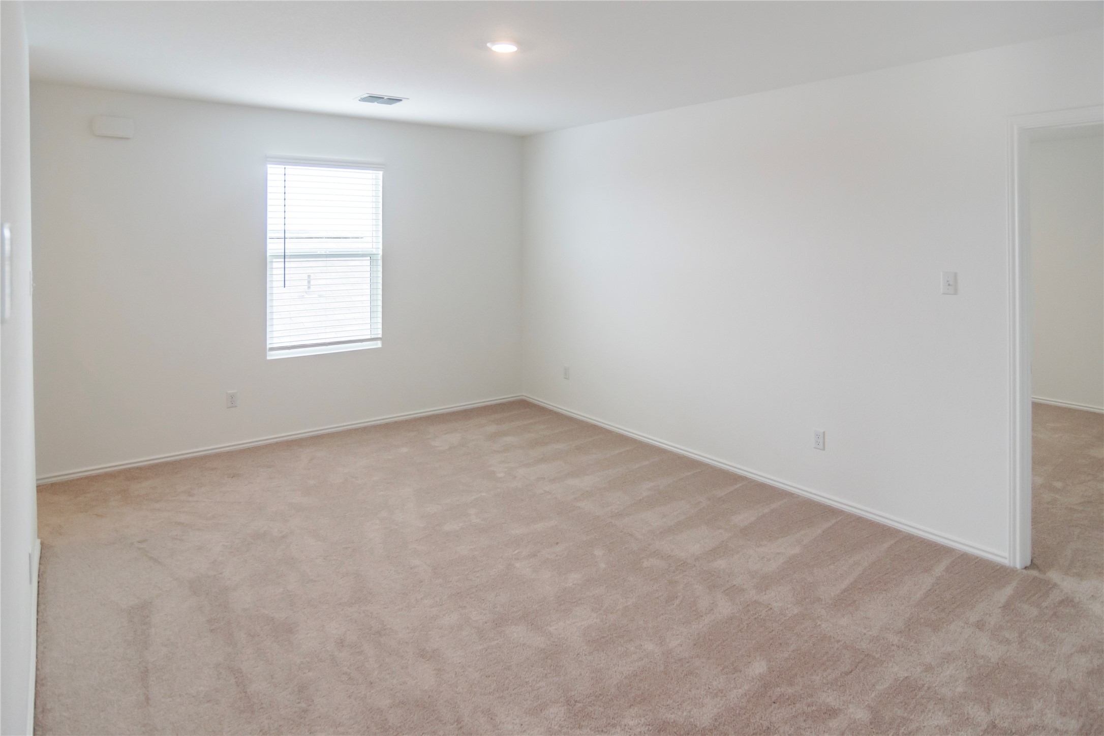 112 Dollars Drive Jarrell, TX 76537 - Photo 11 of 27 an empty room with a window