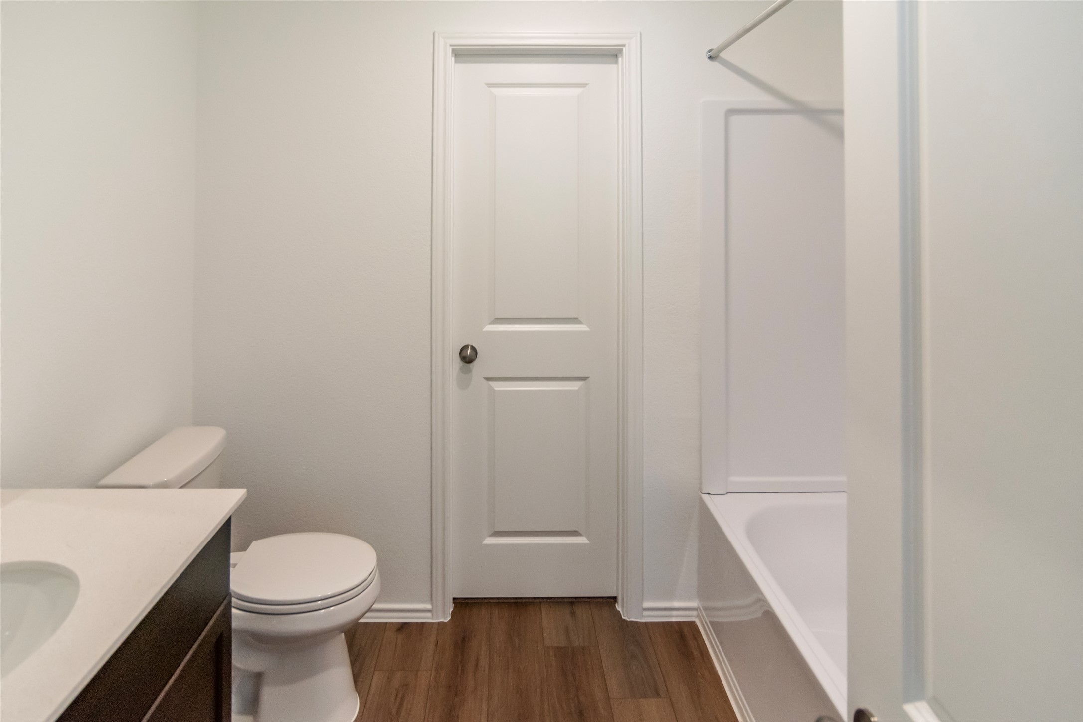 112 Dollars Drive Jarrell, TX 76537 - Photo 14 of 27 a bathroom with a toilet and a shower