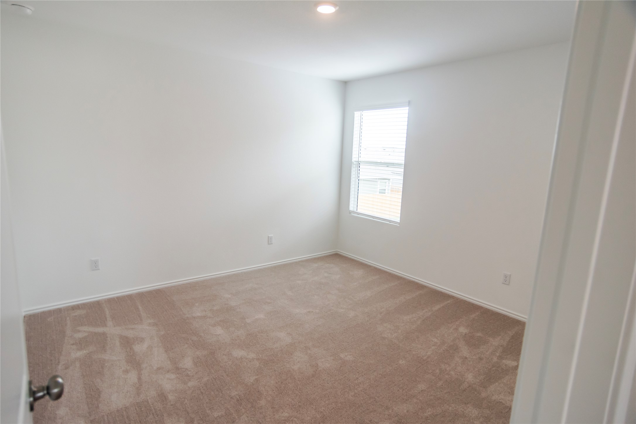 112 Dollars Drive Jarrell, TX 76537 - Photo 16 of 27 an empty room with windows