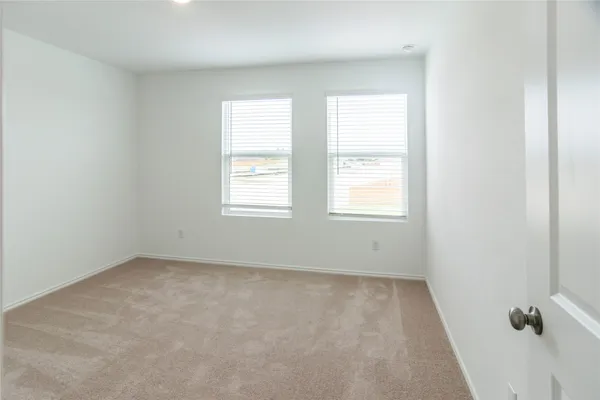 an empty room with a window