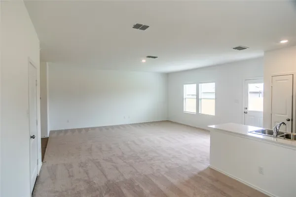 a view of a kitchen and a sink