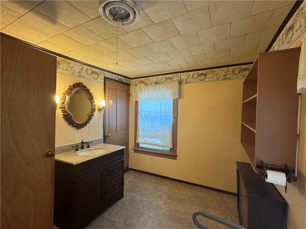 121 North Main Street Cherry Tree, PA 15724 - Photo 13 of 32 a bathroom with a sink a mirror and a shower