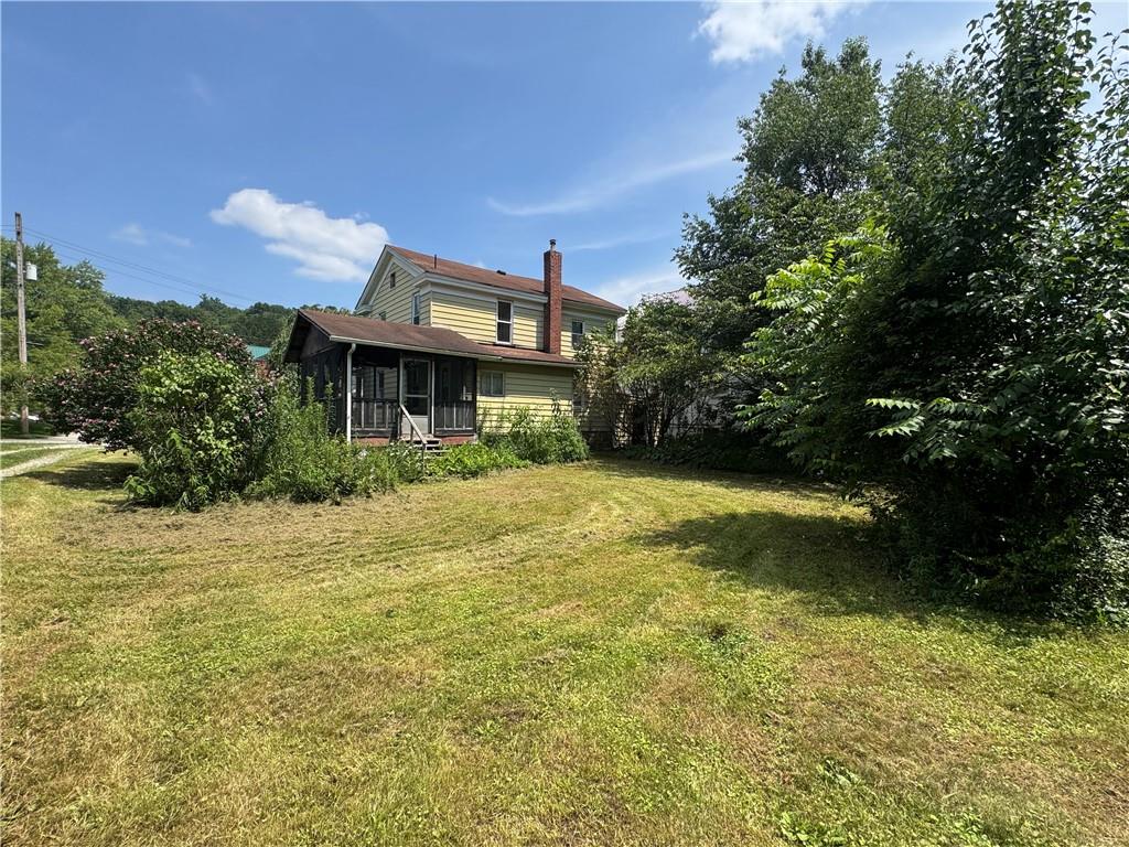 121 North Main Street Cherry Tree, PA 15724 - Photo 26 of 32 a front view of a house with a yard