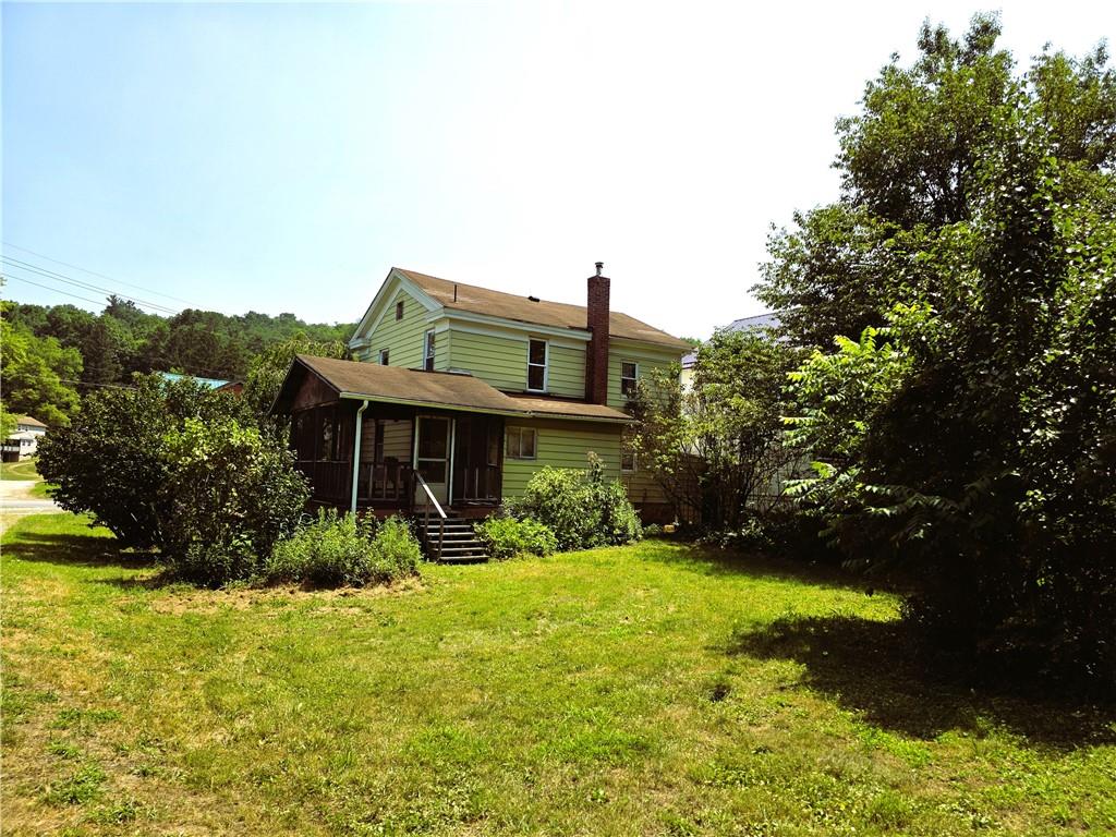 121 North Main Street Cherry Tree, PA 15724 - Photo 28 of 32 a front view of house with yard and green space
