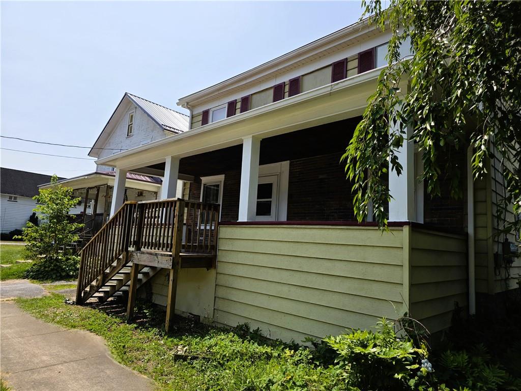 121 North Main Street Cherry Tree, PA 15724 - Photo 29 of 32 a front view of a house with garden