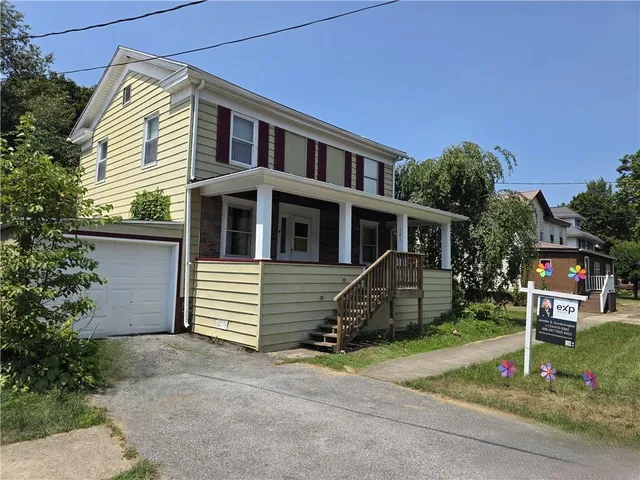 a view of a house with a patio