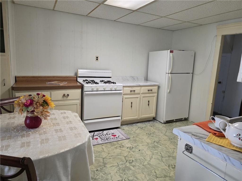 121 North Main Street Cherry Tree, PA 15724 - Photo 8 of 32 a kitchen with stainless steel appliances granite countertop a sink stove and refrigerator